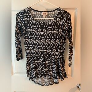 Three quarter length sleeve peplum shirt
